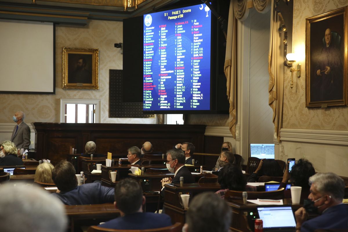 South Carolina Rep. David Hiott, R-Pickens, says a prayer as the House votes on a bill that would ban most abortions in the state on Wednesday, Feb. 17, 2021 in Columbia, S.C. The bill will soon go to the governor.  (Jeffrey Collins)