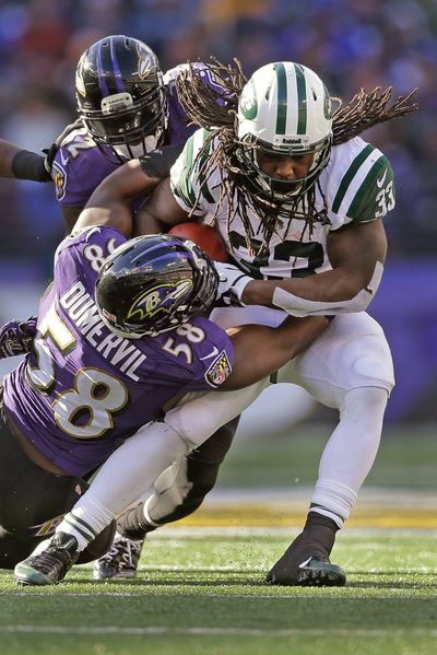 Jets’ Chris Ivory, right, leads NFL running backs with his average of 3.1 yards after contact. (Associated Press)
