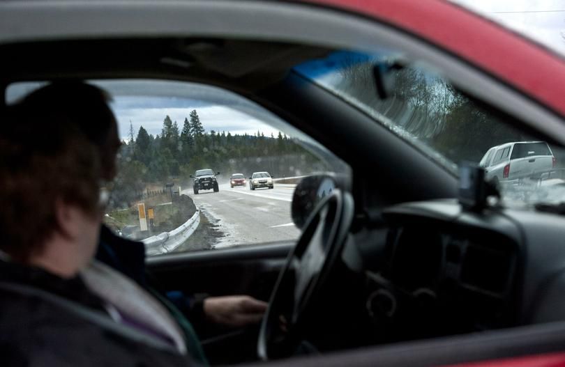 driver waits to turn onto U.S. Highway 95 where the four-lane freeway ends, just south of the Kootenai-Bonner county line on Friday, April l7, 2017. That stretch of road is one of two major construction projects on U.S. 95 in North Idaho that were approved for funding this week from the a transportation bill that Idaho lawmakers passed, which includes $300 million in new highway bonding. (Kathy Plonka / The Spokesman-Review)