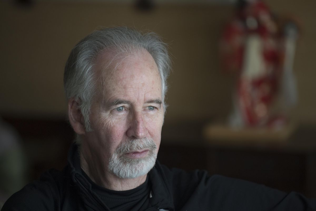 Retired attorney John Lynch has suffered with rheumatoid arthritis since he was a child. He has written a  book about his experiences. (Jesse Tinsley / The Spokesman-Review)