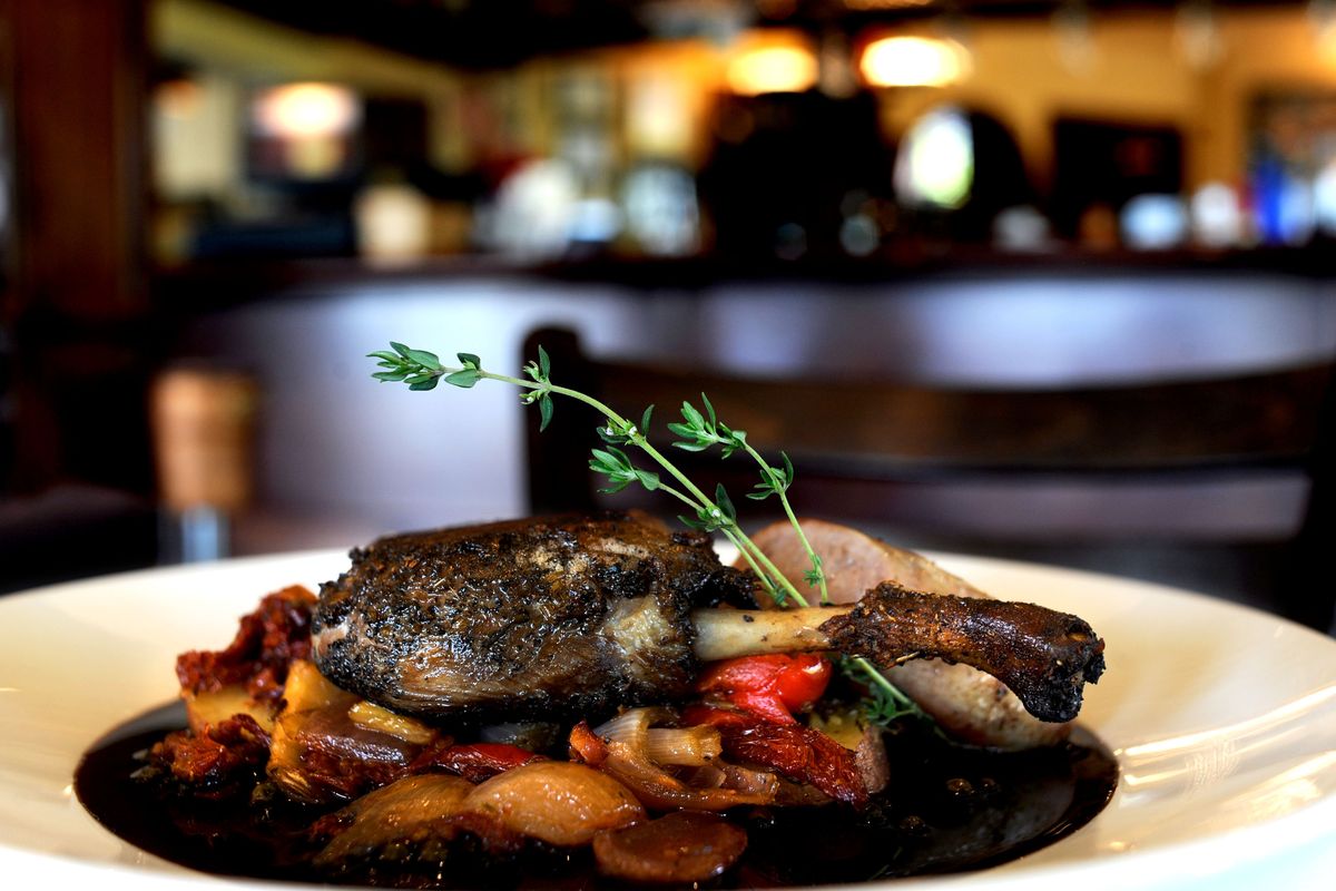 One of the main courses offered at Fleur de Sel is the duck sausage and duck leg confit, featuring sun-dried tomato and fennel ragout, along with a green peppercorn demi-glace. (Kathy Plonka)