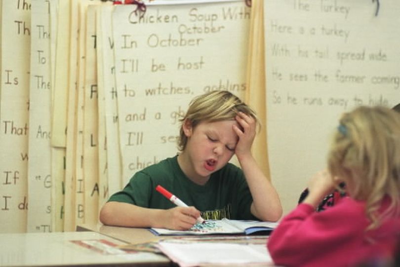 Garden Springs 1st grader Cody Gronau works on his pronouncation of the 