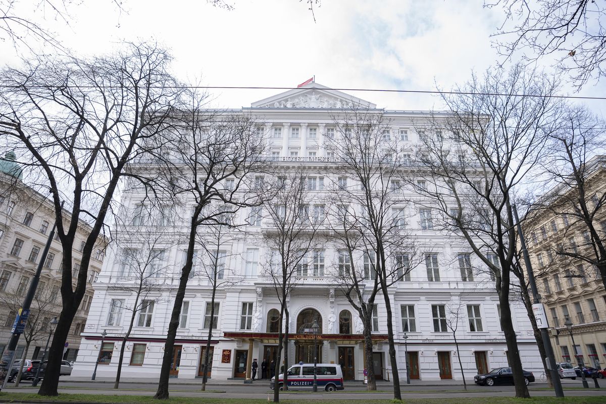 Police officers stand in front of Hotel Imperial where a delegation from Iran is staying in Vienna, Austria, Tuesday, April 6, 2021. Foreign ministry officials from the countries still in the accord, the so-called Joint Comprehensive Plan of Action, are meeting in Vienna to push forward efforts to bring the United States back into the 2015 deal on Iran’s nuclear program.  (Florian Schroetter)