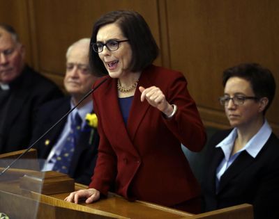 In this Jan. 9, 2017, file photo, Oregon Gov. Kate Brown delivers her inaugural speech in the Capitol House chambers in Salem, Ore. The Oregon House on July 1, 2017, advanced a $10 million reproductive health care bill that would require all insurance companies across the state to cover abortions and a variety of other reproductive services at no cost to the patient. (Don Ryan / Associated Press)