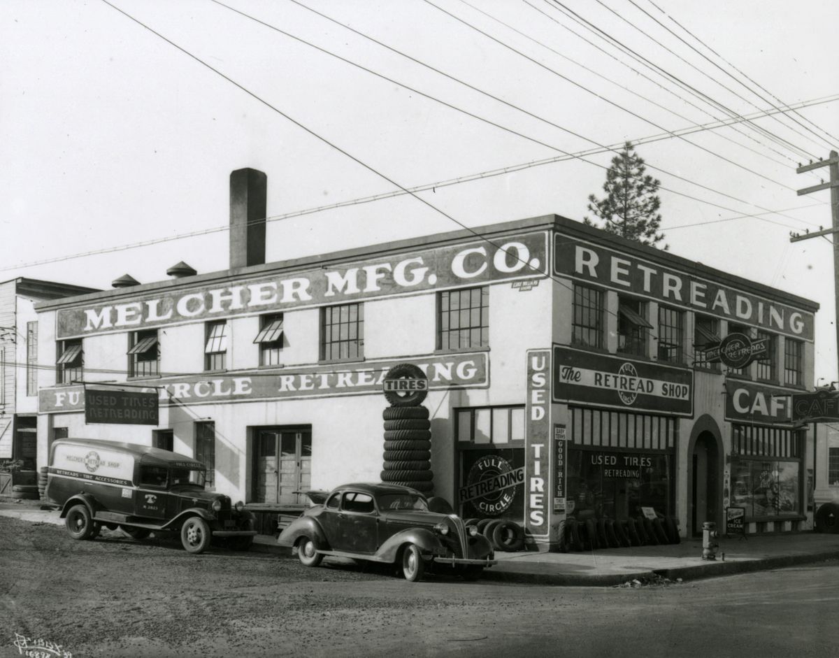 1939: Successful tire dealer Walter S. Melcher ran tire shops around Spokane like this one at 720 E. Sprague Ave., in the 1920s and 1930s. He sold name-brand tires but also  retreaded tires for many years. Elmer Morlan and his brothers bought the business in 1943 and ran it until 2005. (Libby Collection/Eastern Washington Historical Society)