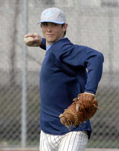 
Senior catcher KC Mack of Central Valley High takes aim during practice Wednesday. He catches for two of the best pitchers in the GSL, seniors Rusty Shellhorn and Trevor Shull.
 (J. BART RAYNIAK / The Spokesman-Review)