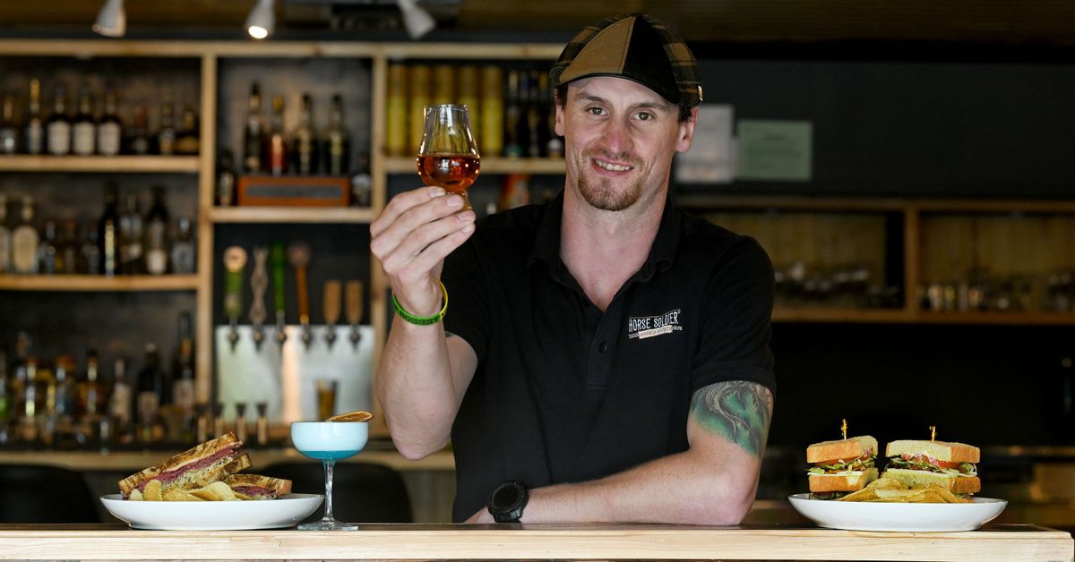Steve Eggers of Local Flavors, a small, family-owned sandwich shop and whiskey bar on the South Hill, is photographed on June 11. (Kathy Plonka/The Spokesman-Review)