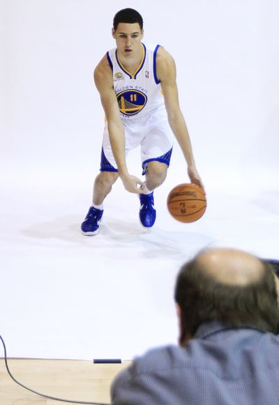 Golden State rookie Klay Thompson poses for photos during Monday’s media day. (Associated Press)