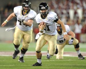 In this 2013 SR file photo, Idaho quarterback Chad Chalich (11) runs the ball against Washington State during the first half of a college football game at Martin Stadium in Pullman, Wash. Chalich, who transferred to Montana, will lead the Grizzlies this week. (Tyler Tjomsland / SR file photo)