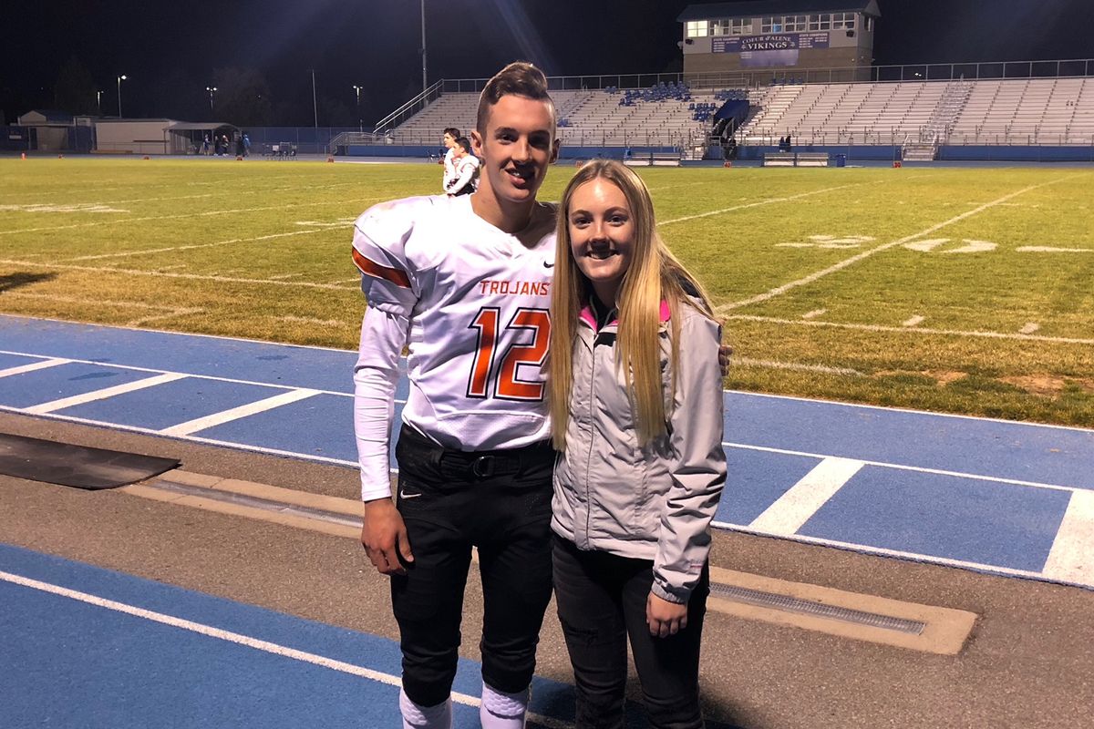 In an undated family photo, Derek Curtis and sister Haley Curtis pose after a Post Falls football game.  (Michelle Curtis/courtesy)
