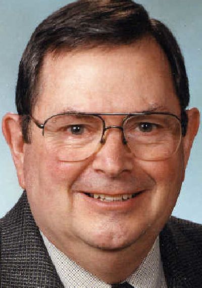 
Cox
 (The Spokesman-Review)