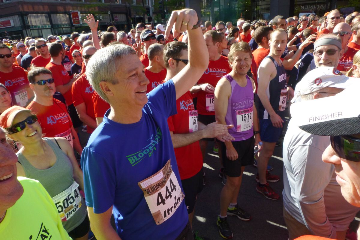 Don Kardong points himself out in the crowd as he's introduced as the race founder before the start of Bloomsday 2016.   (Rich Landers)