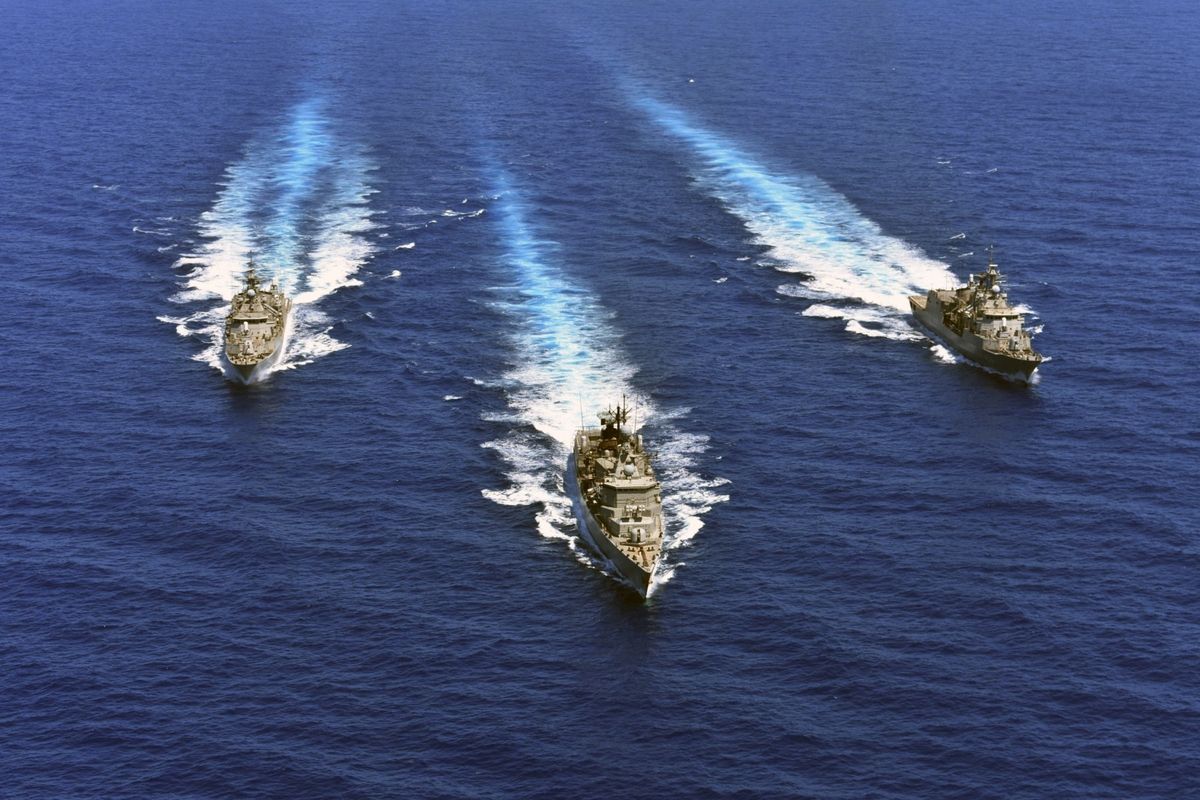 In this photo provided by the Greek Defense Ministry, warships take part in a military exercise in Eastern Mediterranean sea, on Tuesday, Aug. 25, 2020. Germany