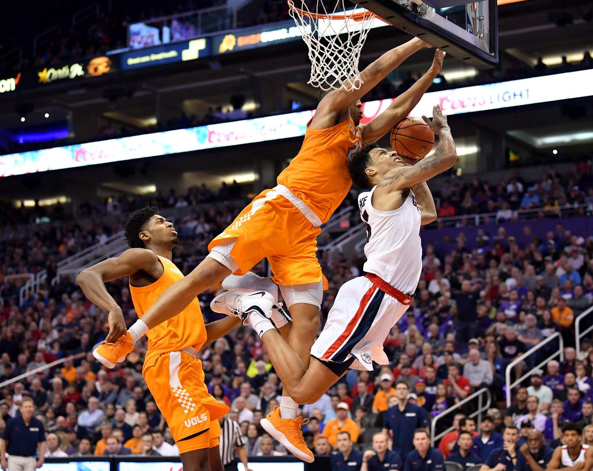 Gonzaga Bulldogs forward Brandon Clarke (15) is fouled by Tennessee Volunteers forward Grant Williams (2) during the second half of a college basketball game on Sunday, December 9, 2018, at Talking Stick Resort Arena in Phoenix, Ariz. Tennessee Volunteers won the game 76-73. (Tyler Tjomsland / The Spokesman-Review)