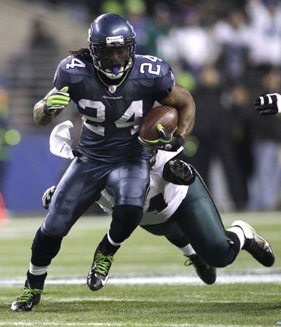 Seahawks running back Marshawn Lynch has scored a touchdown in 11 consecutive games. (Associated Press)