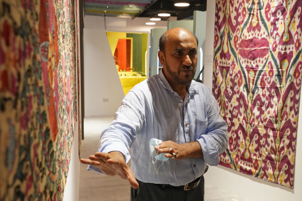 Mohammed Omer Rahimy speaks to the Associated Press at the Afghanistan pavilion at Expo 2020 in Dubai, United Arab Emirates, Thursday, Oct. 7, 2021. Rahimy has opened the Afghanistan pavilion at Expo 2020 about a week after the world