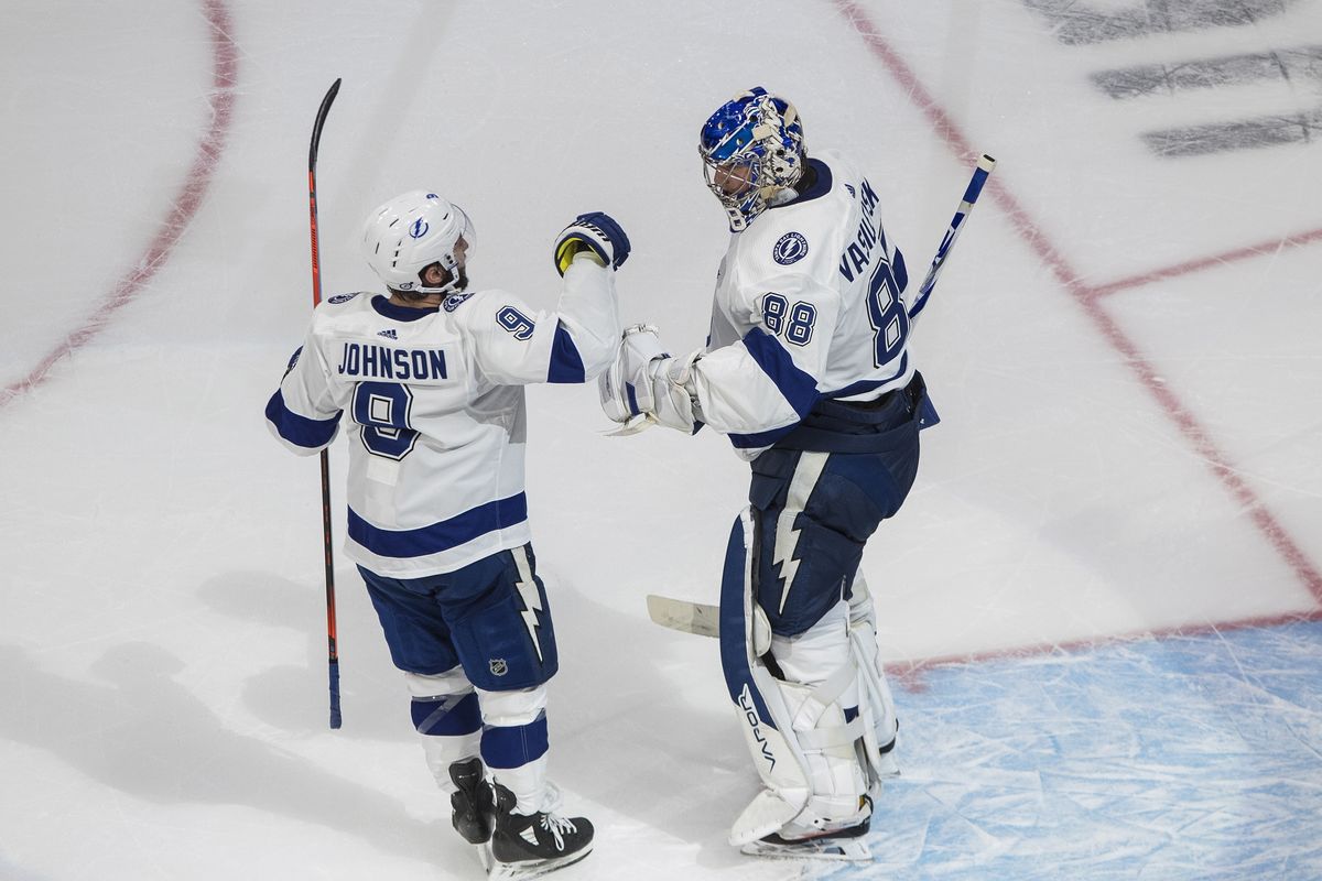 Tampa Bay center Tyler Johnson (9) and goalie Andrei Vasilevskiy (88) celebrate the team’s win over the Dallas Stars during Game 3 of the NHL hockey Stanley Cup Final, Wednesday in Edmonton, Alberta.  (JASON FRANSON)