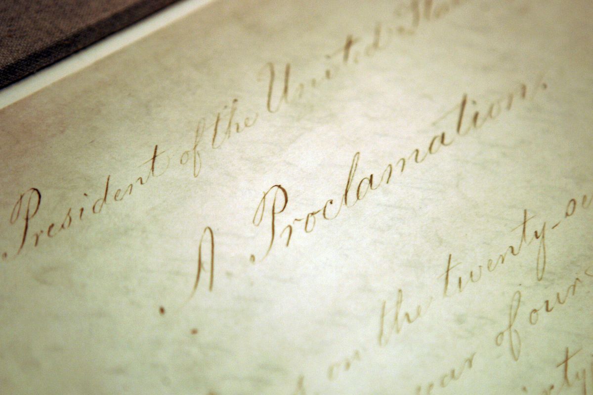 FILE - This Feb. 18, 2005, file photo shows the original Emancipation Proclamation on display in the Rotunda of the National Archives in Washington. President Abraham Lincoln first issued the Emancipation Proclamation declaring all slaves free in Confederate territory on Sept. 22, 1862. New York Governor Andrew Cuomo signed an executive order Wednesday, June 17, 2020, recognizing Juneteenth as a paid holiday for state employees to commemorate the emancipation of slaves in the U.S.  (Evan Vucci)