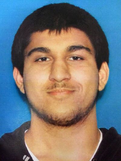 This undated Department of Licensing photo posted Saturday, Sept. 24, 2016, by the Washington State Patrol on its Twitter page shows Arcan Cetin, 20, of Oak Harbor, Wash. (Associated Press)