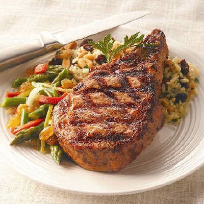 
 Grilled Veal Chop with California Raisin Pilaf with USA-Grown Toasted Peanuts
 (California Raisin Marketing Board/Great Steakhouse Steaks/National Peanut Board / The Spokesman-Review)