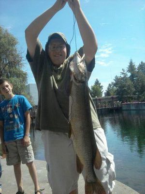 Joe Buster of Spokane landed this northern pike in Riverfront Park across from the Carousel while fishing for trout on Saturday, Aug. 13, two days before his 18th birthday. He said the fish measured 42 inches long. Since he was getting around by city bus, his friend transported the fish home three miles on his bicycle.
 (Courtesy photo)
