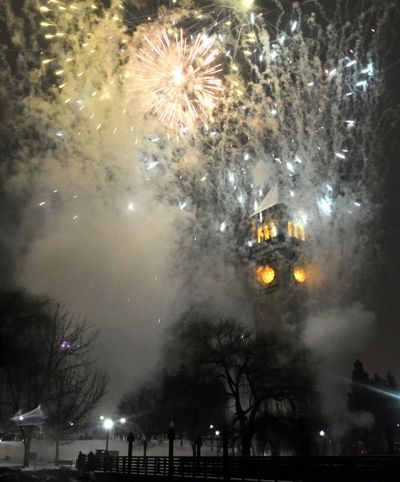Fireworks burst over the Riverfront Park Clocktower as 2009 turns to 2010 in Spokane. (Jesse Tinsley / The Spokesman-Review)