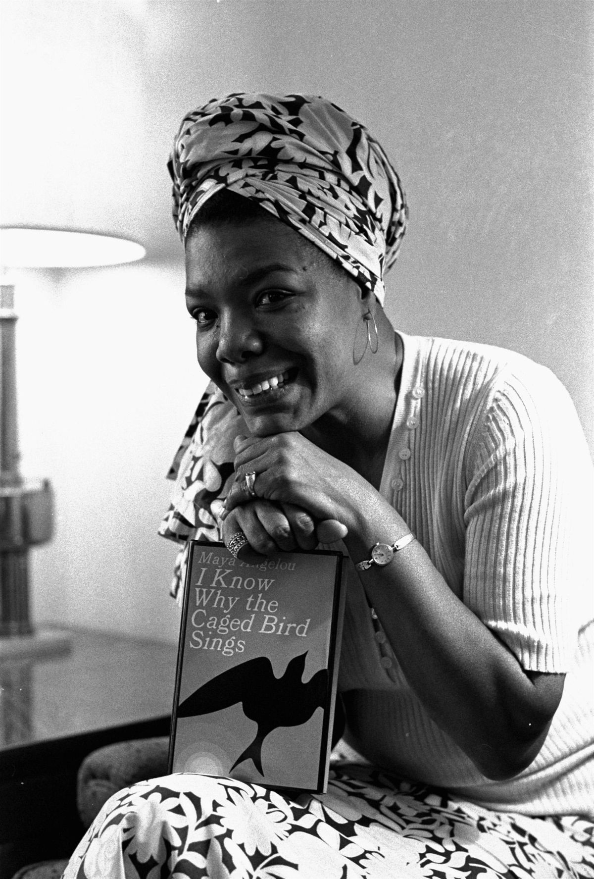 FILE - In this Nov. 3, 1971 file photo, Maya Angelou poses with a copy of her book, "I Know Why the Caged Bird Sings," in Los Angeles. Angelou, a Renaissance woman and cultural pioneer, has died, Wake Forest University said in a statement Wednesday, May 28, 2014. She was 86. 