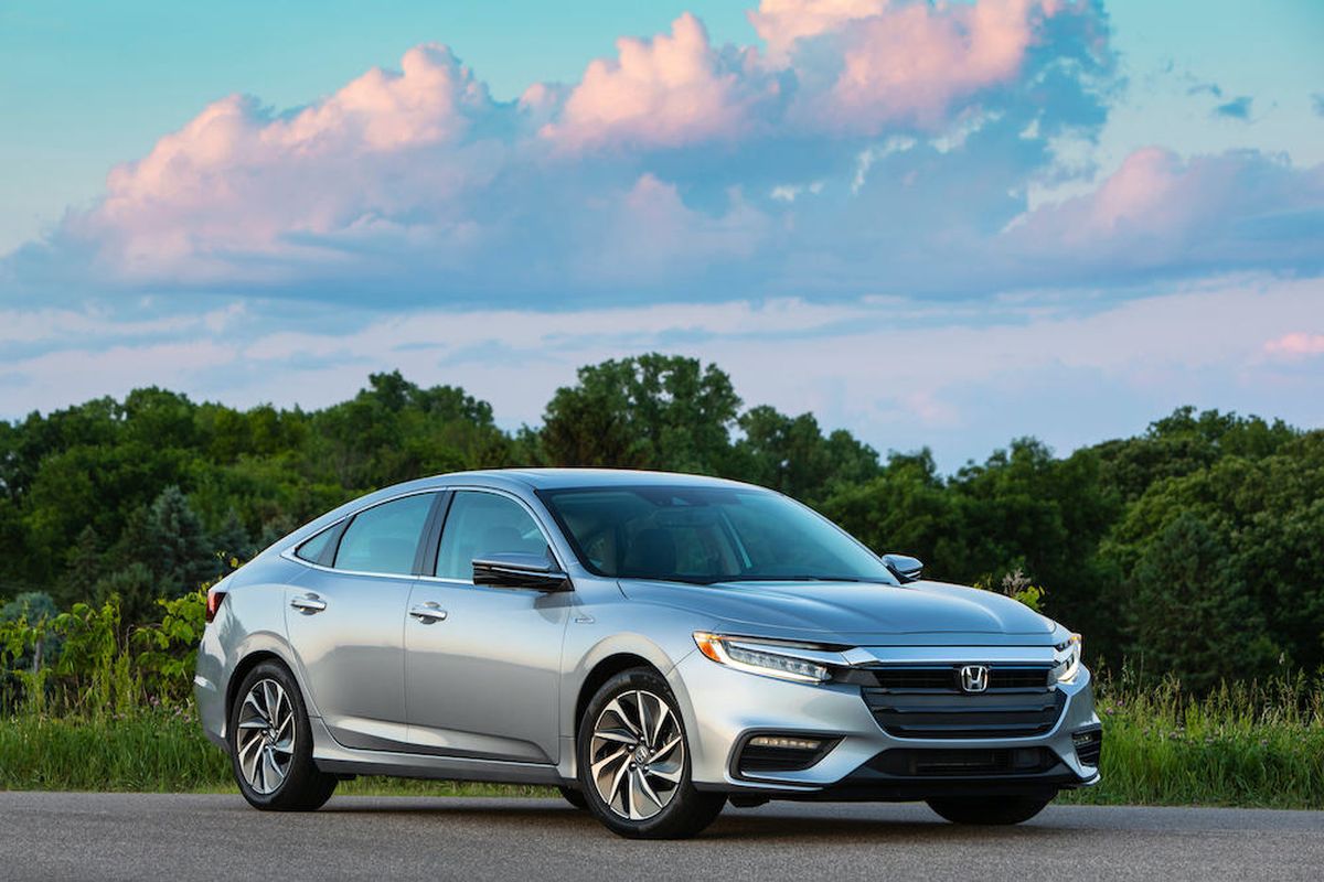 The Insight is based on Honda’s Civic and is about the same size. The Insight is more softly contoured that its donor car and is topped by a coupe-like roofline. (Honda)