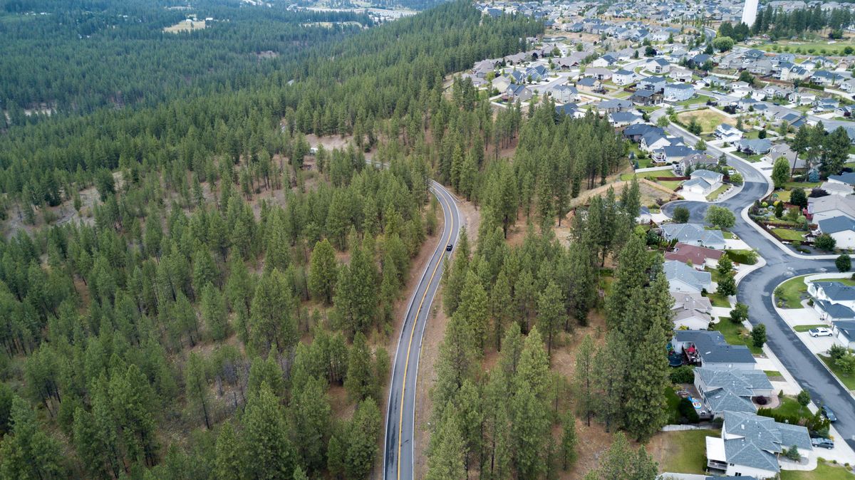 Developers would like to create a neighborhood similar to Eagle Ridge, at right, to the left of, and west of, Cedar Road in southwest Spokane County if plans come to fruition. The land, sloping down to Spokane Memorial Gardens cemetery on Cheney-Spokane Road, is owned by Fairmount Memorial Association, which controls the cemetery. (Jesse Tinsley / The Spokesman-Review)