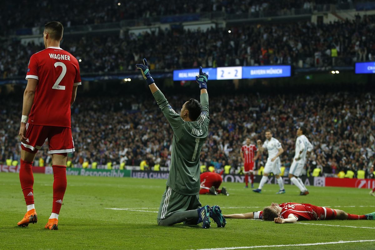 Real Madrid’s goalkeeper Keylor Navas, center, celebrates after Madrid reached its third straight Champions League final 4-3 on aggregate at the Champions League semifinal second leg soccer match between Real Madrid and FC Bayern Munich at the Santiago Bernabeu stadium in Madrid, Spain, Tuesday, May 1, 2018. (Paul White / Associated Press)