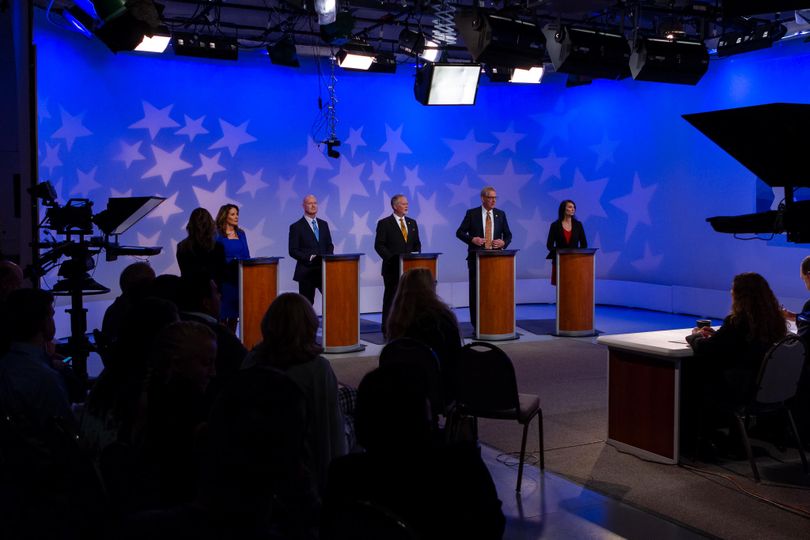 The five GOP candidates for lieutenant governor talk with debate moderator Melissa Davlin shortly before the start of their face-off in the 