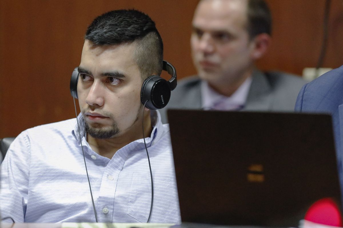Cristhian Bahena Rivera listens to testimony that has been translated into Spanish by an interpreter during his trial at the Scott County Courthouse in Davenport, Iowa, Thursday, May 20, 2021. Bahena Rivera is charged with first-degree murder in the death of Mollie Tibbetts.  (Jim Slosiarek)
