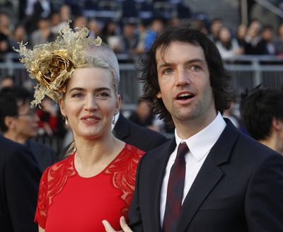 British actress Kate Winslet is pictured with Ned Rocknroll at a horse race in Hong Kong on Dec. 9. The two wed earlier this month in New York. (Associated Press)