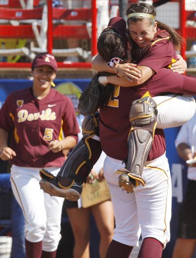 Arizona State catcher Kaylyn Castillo jumps into the arms of pitcher Dallas Escobedo after earning a spot in the WCWS finals. (Associated Press)