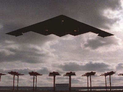 
The B-2 Stealth Bomber, made by the Northrop Grumman Corp. is shown landing at Whiteman Air Force Base, Mo. Northrop Grumman Corp.'s third-quarter earnings edged higher but were hurt by a legal provision that also forced the military contractor and shipbuilder to cut its full-year forecast. 
 (Associated Press / The Spokesman-Review)