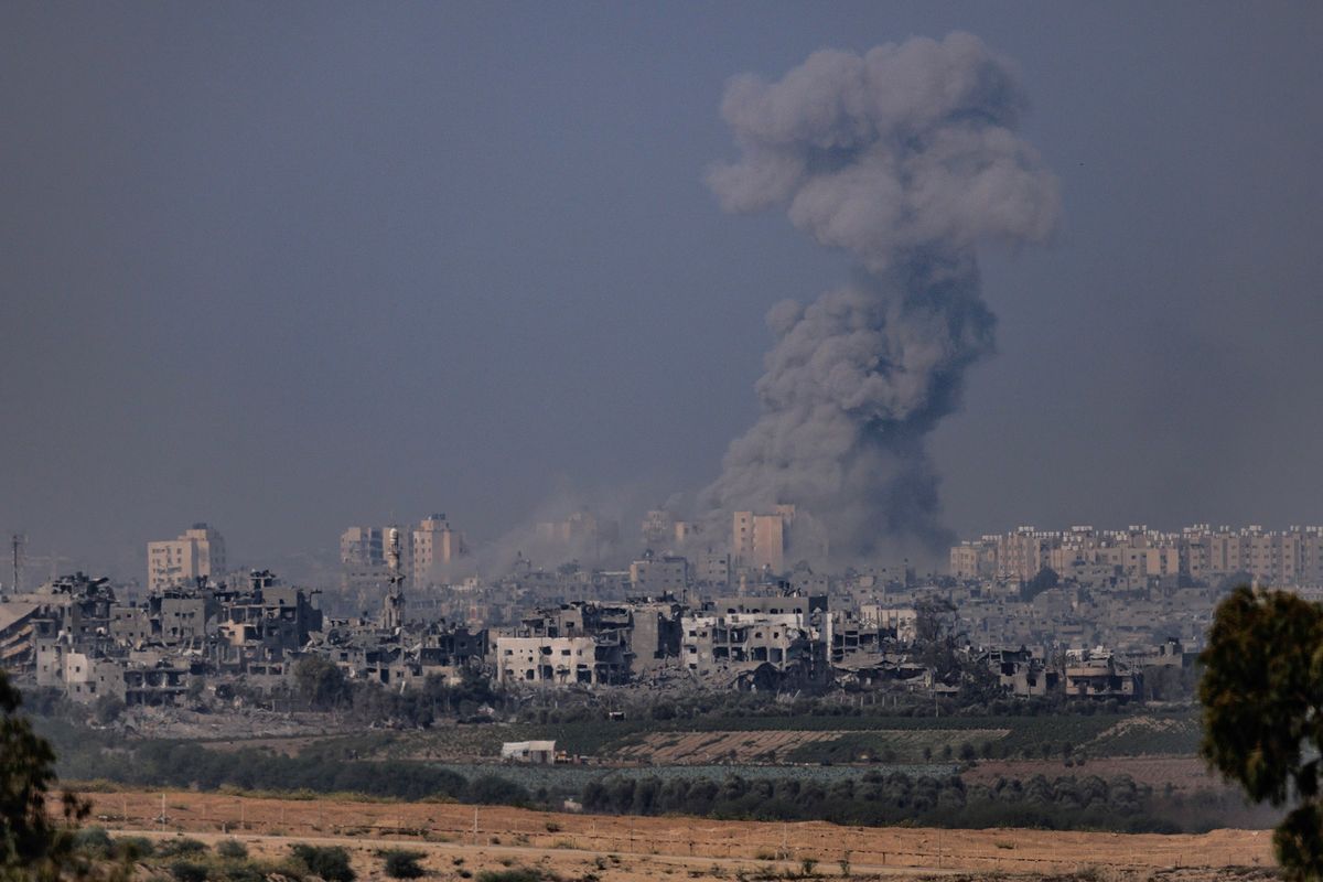Smoke rises from an explosion in Gaza on Saturday as seen from Sderot, Israel. (Dan Kitwood)
