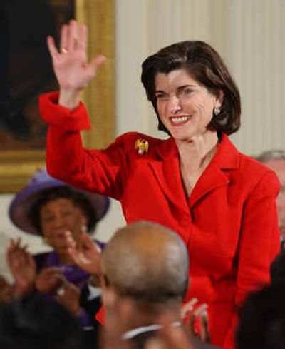 
Luci Baines Johnson Turpin, daughter of President Lyndon Johnson, waves at the White House Thursday. Her father signed the Civil Rights Act in 1964.
 (Associated Press / The Spokesman-Review)
