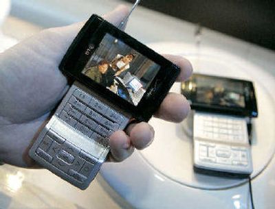 
LG's VX9400 mobile phones with Verizon V Cast Mobile TV service are shown at the Consumer Electronics Show in Las Vegas.
 (Associated Press / The Spokesman-Review)