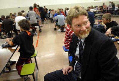 
Mark Purvine, new principal at East Valley Middle School, chats with a table full of students during seventh-grade lunch at the school  Tuesday.
 (Holly Pickett / The Spokesman-Review)