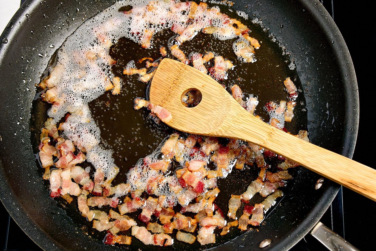 Cooking bacon for Pumpkin Pasta With Bacon and Goat Cheese.  (Peggy Cormary for The Washington Post/Food styling by Lisa Cherkasky )