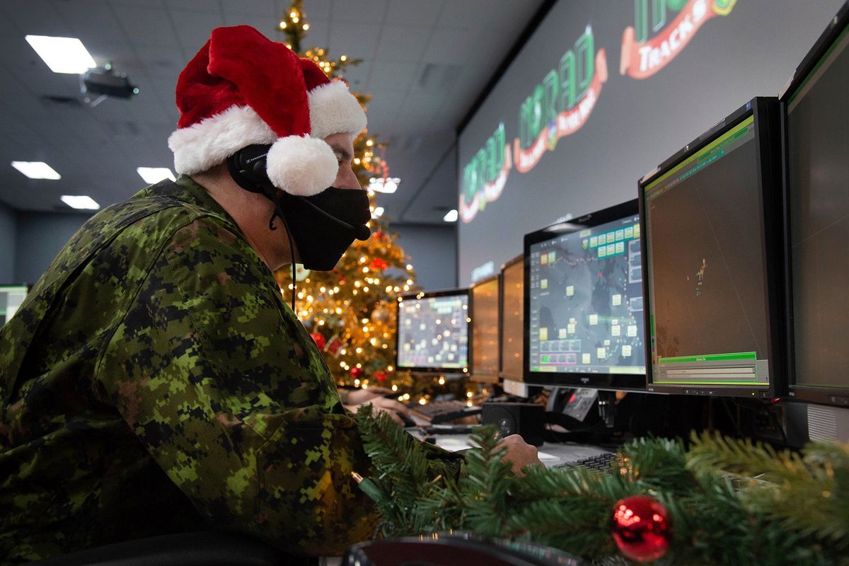 A 22 Wing member of the North American Aerospace Defense Command shows how they track Santa on his sleigh on Christmas evening at the Canadian Forces Base in North Bay on Dec. 9.  (Sable Brown)