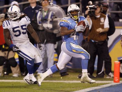 Chargers running back Darren Sproles caps his big game Saturday by scoring the winning touchdown in overtime.  (Associated Press / The Spokesman-Review)