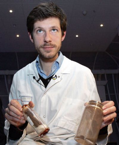 
Dr. Philippe Charlier displays  remains last February that were thought to be of  Joan of Arc but are, in fact, those of an Egyptian mummy, according to researchers. 
 (File Associated Press / The Spokesman-Review)