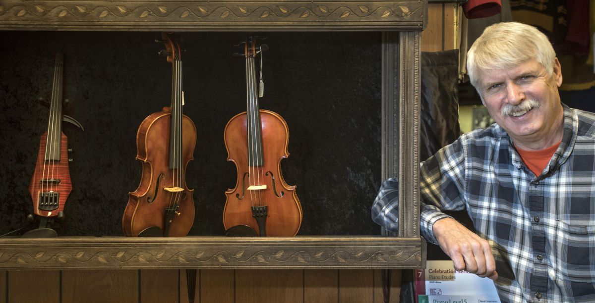 Robin Amend learned to read music before words and started clarinet lessons at age 6, followed by oboe, trombone and saxophone. He and his wife, Debbie, have co-owned Amend Music Center for nearly 40 years. (Dan Pelle / The Spokesman-Review)