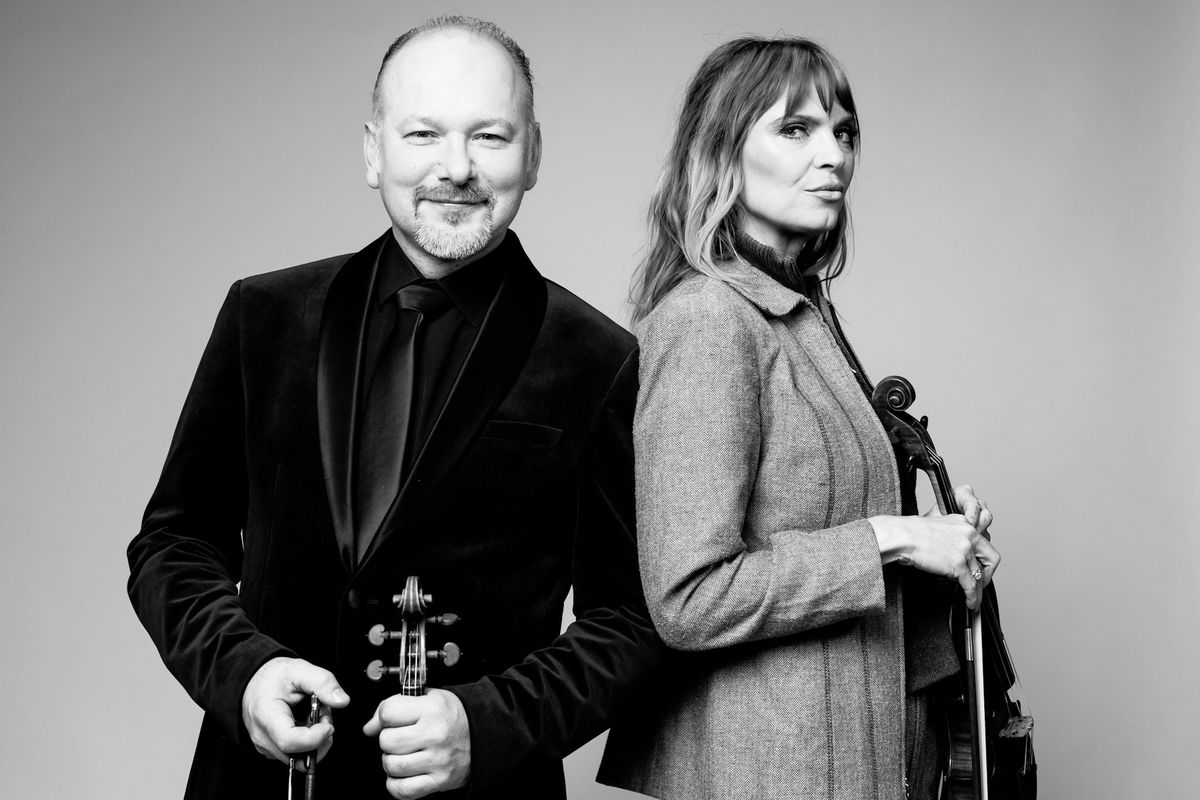 First violinist and concertmaster Mateusz Wolski and second violinist Amanda Howard Phillips. Wolski will be featured as part of “Masterworks 7: Primavera” in the Spokane Symphony’s 2025-26 season. (Courtesy of Danny Cordero)