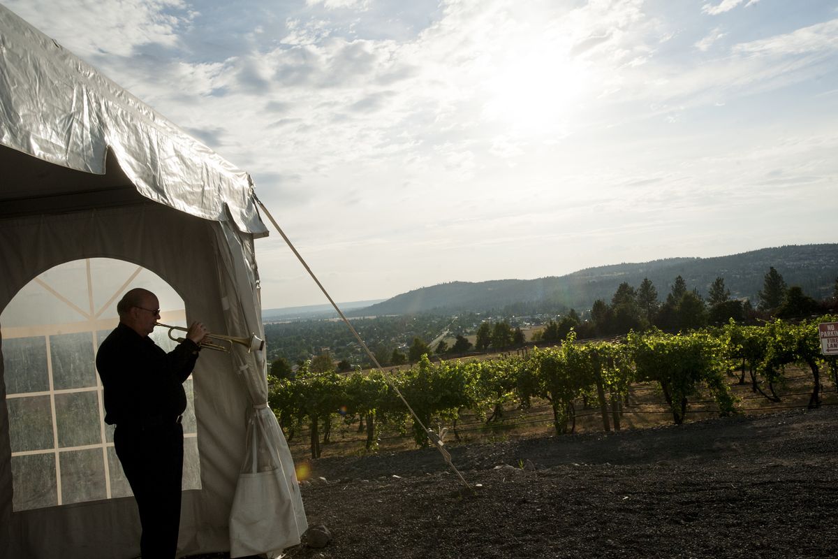 Larry Jess warms up before performing with the Spokane Symphony on Wednesday at Arbor Crest Winery. (Tyler Tjomsland)