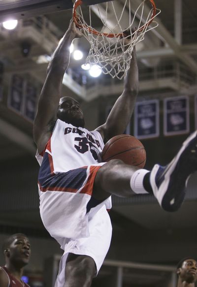 Gonzaga�s Sam Dower (35) dunks during the second half of an NCAA basketball game against New Mexico State, in Spokane, Wash., on Saturday, Dec. 7, 2013. Gonzaga won 80-68. (Young Kwak / Fr159675 Ap)