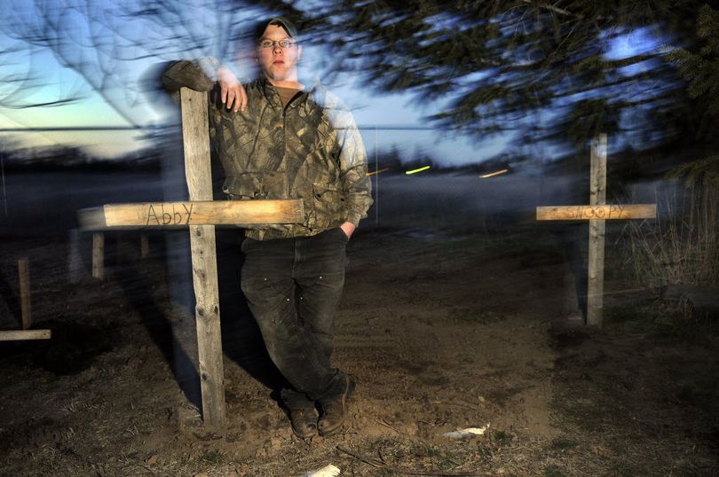 David Cheney has buried his two dogs in his backyard on the 3300 block of east 55th Ave in Spokane, Wa. The dogs, Abby and Snoopy, died after someone feed them poisoned meatballs. DAN PELLE danp@spokesman.com 2/22/2010 (Dan Pelle / The Spokesman-Review)