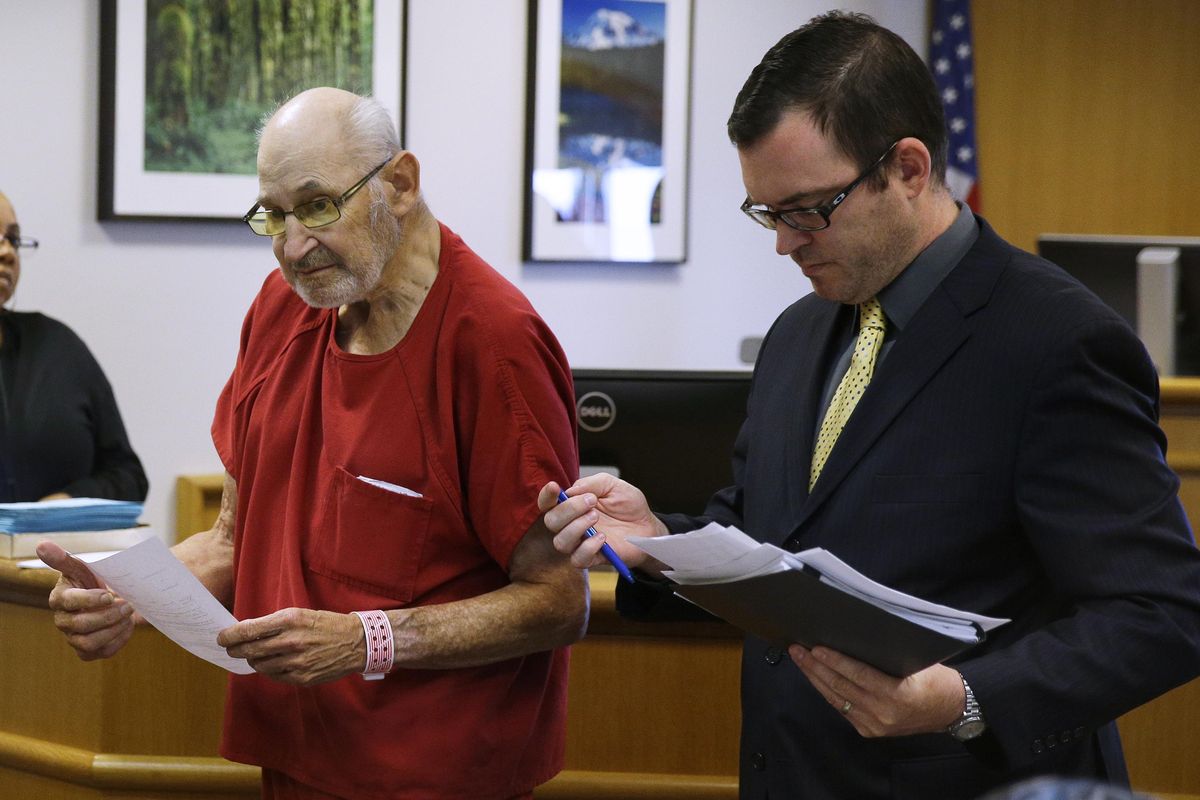 Thomas Emery, left, leaves court with his attorney, Joshua Poisel, after he appeared for an arraignment hearing, Thursday, Aug. 31, 2017, in Seattle. (Ted S. Warren / Associated Press)