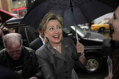 
Sen. Hillary Rodham Clinton, D-N.Y., shakes hands with well-wishers outside of a firehouse in New York on Wednesday. Clinton was re-elected during the midterm elections by a large majority.
 (Associated Press / The Spokesman-Review)